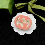 Gucci Interlocking G Silicone Brooch In Gold/Pink