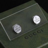 Gucci Logo Engraved Earrings In Silver